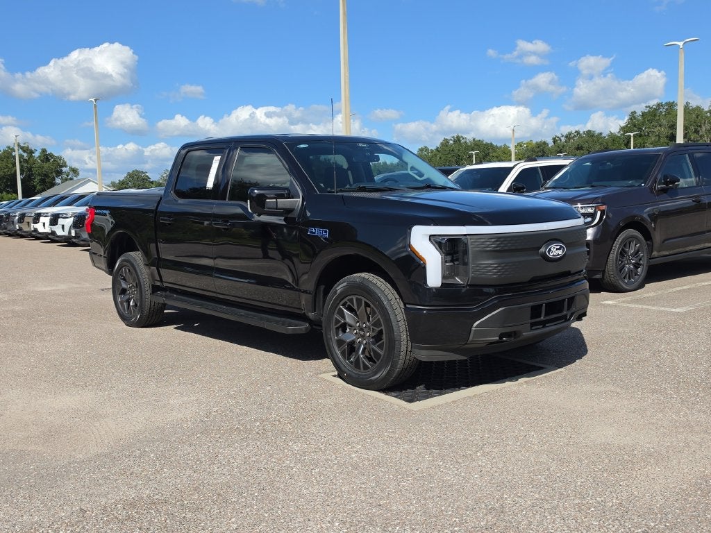 Certified 2024 Ford F-150 Lightning XLT with VIN 1FTVW3LK0RWG05021 for sale in Wesley Chapel, FL