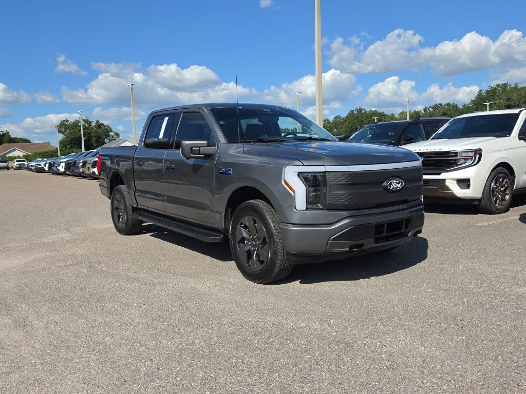 Certified 2024 Ford F-150 Lightning XLT with VIN 1FTVW3LK7RWG19997 for sale in Wesley Chapel, FL