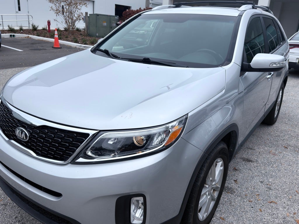 Used 2014 Kia Sorento LX with VIN 5XYKT3A6XEG525668 for sale in Wesley Chapel, FL