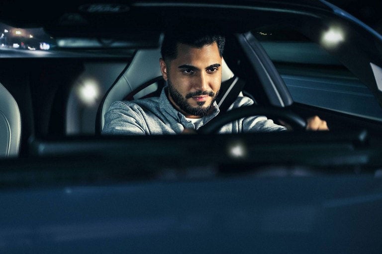 Person sitting in the driver’s seat of a parked 2024 Ford Mustang® coupe | Parks Ford of Wesley Chapel in Wesley Chapel FL